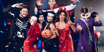 Halloween,Party.,Six,Friends,In,Costume,Cine,Villains,Posing,With