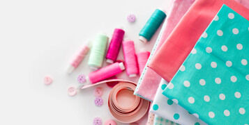 Accessories,For,Sewing,Lie,On,A,White,Background.,Measuring,Tape,